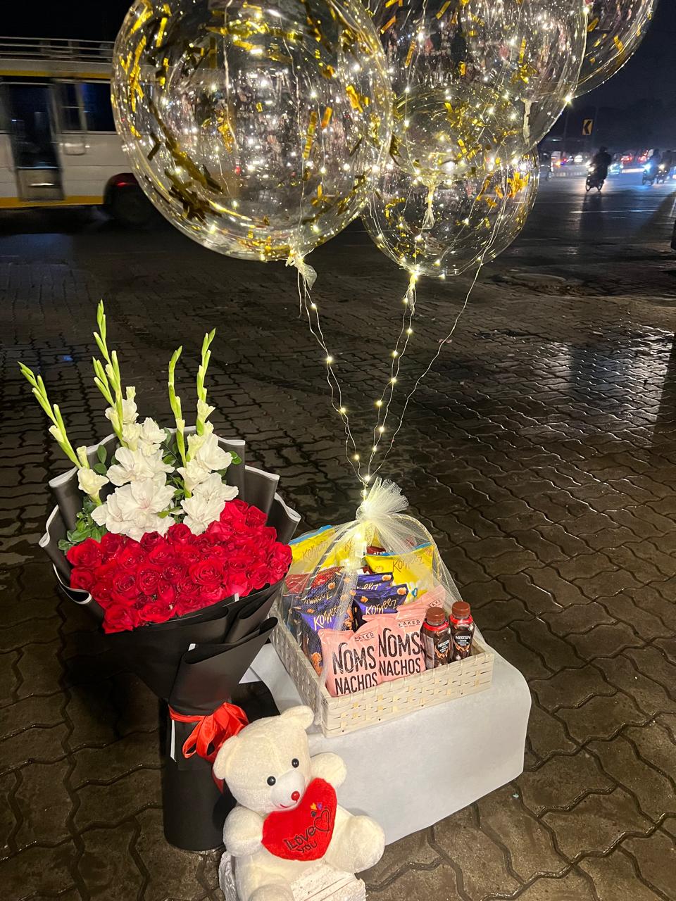 IMG-20251202-WA0016 Luxury Love & Treats Hamper: Roses, Bear, Snacks & Fairy Light Balloons - Image 1